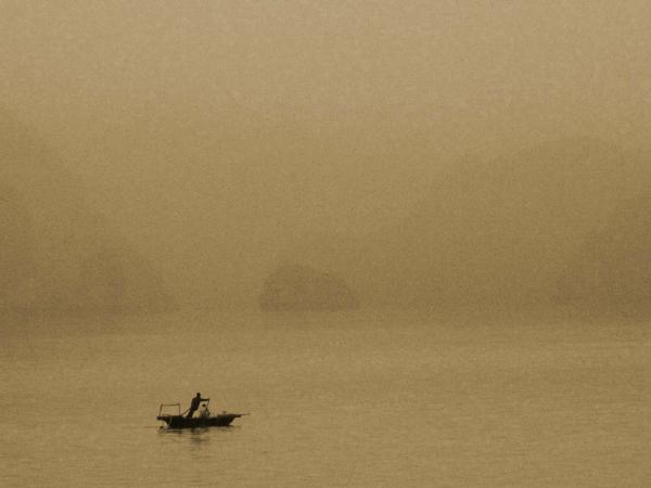 Lone Boat on Ha Long Bay