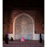 Woman praying at the Mosque